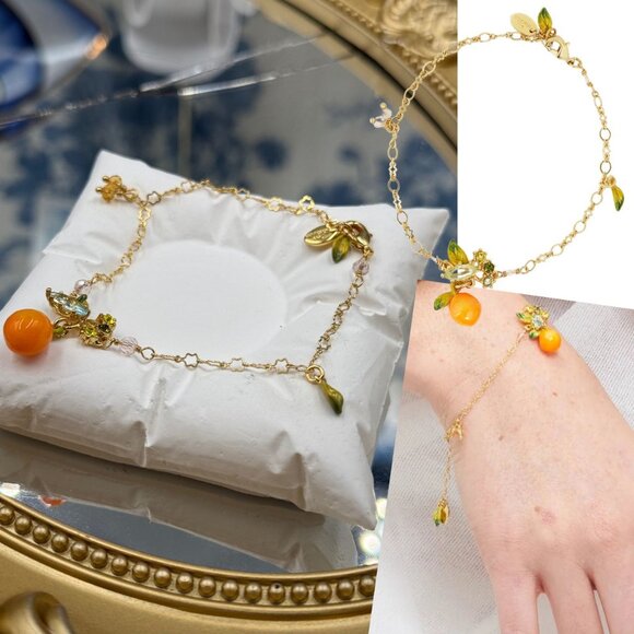 🆕 LES NEREIDES 🧿 NIB Orange and Little Leaves Thin Bracelet - Picture 1 of 16